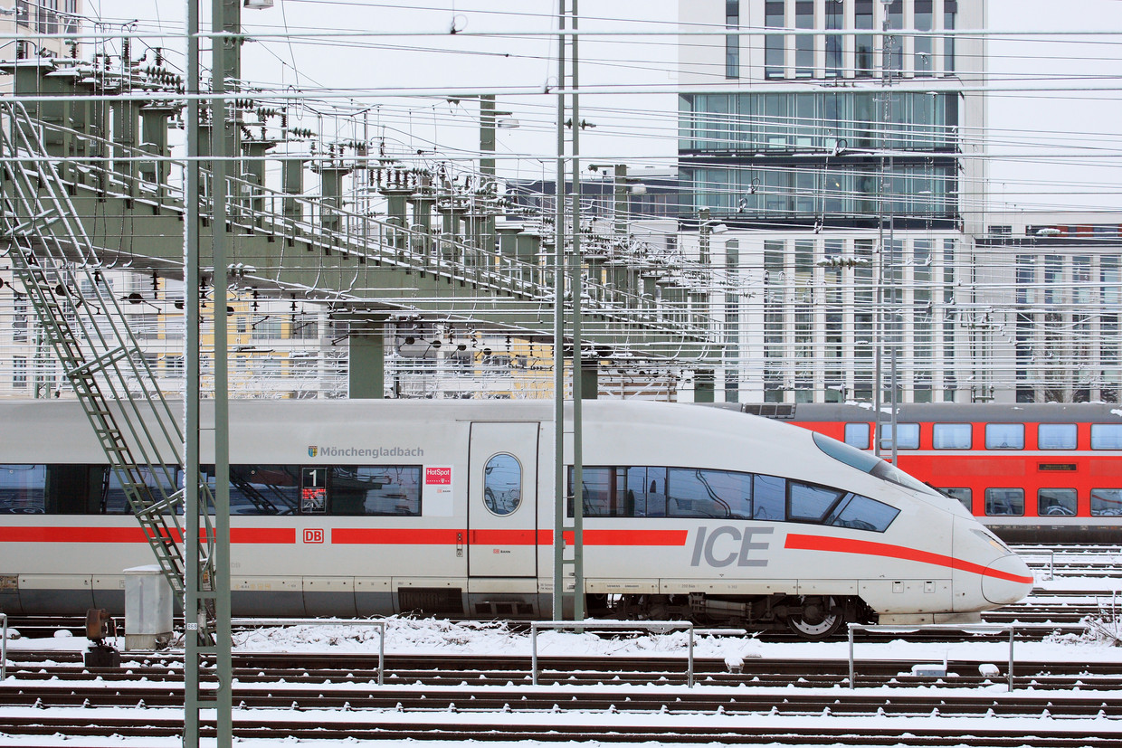 modern high speed train in the city in winter