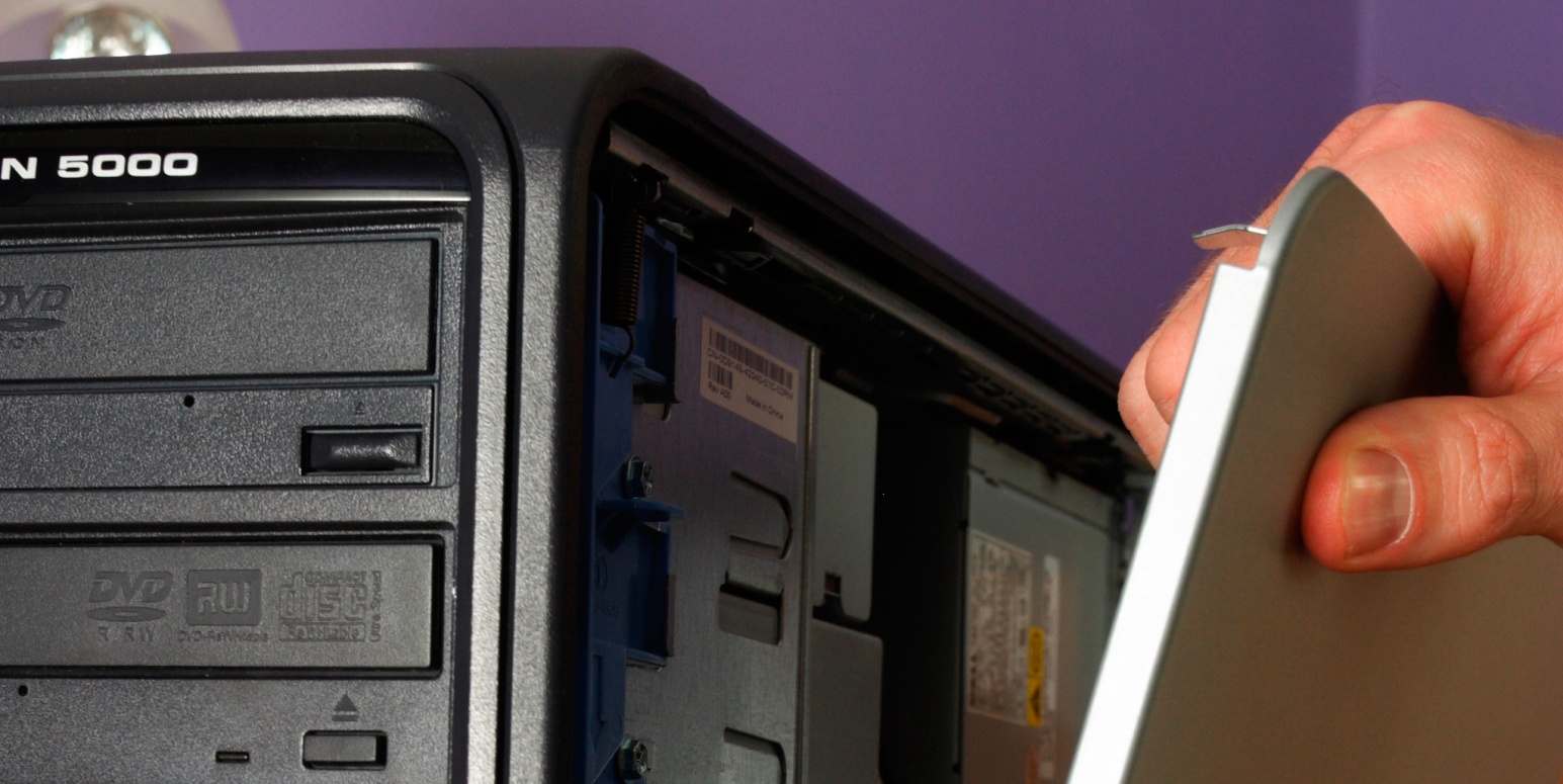 hand opens a PC