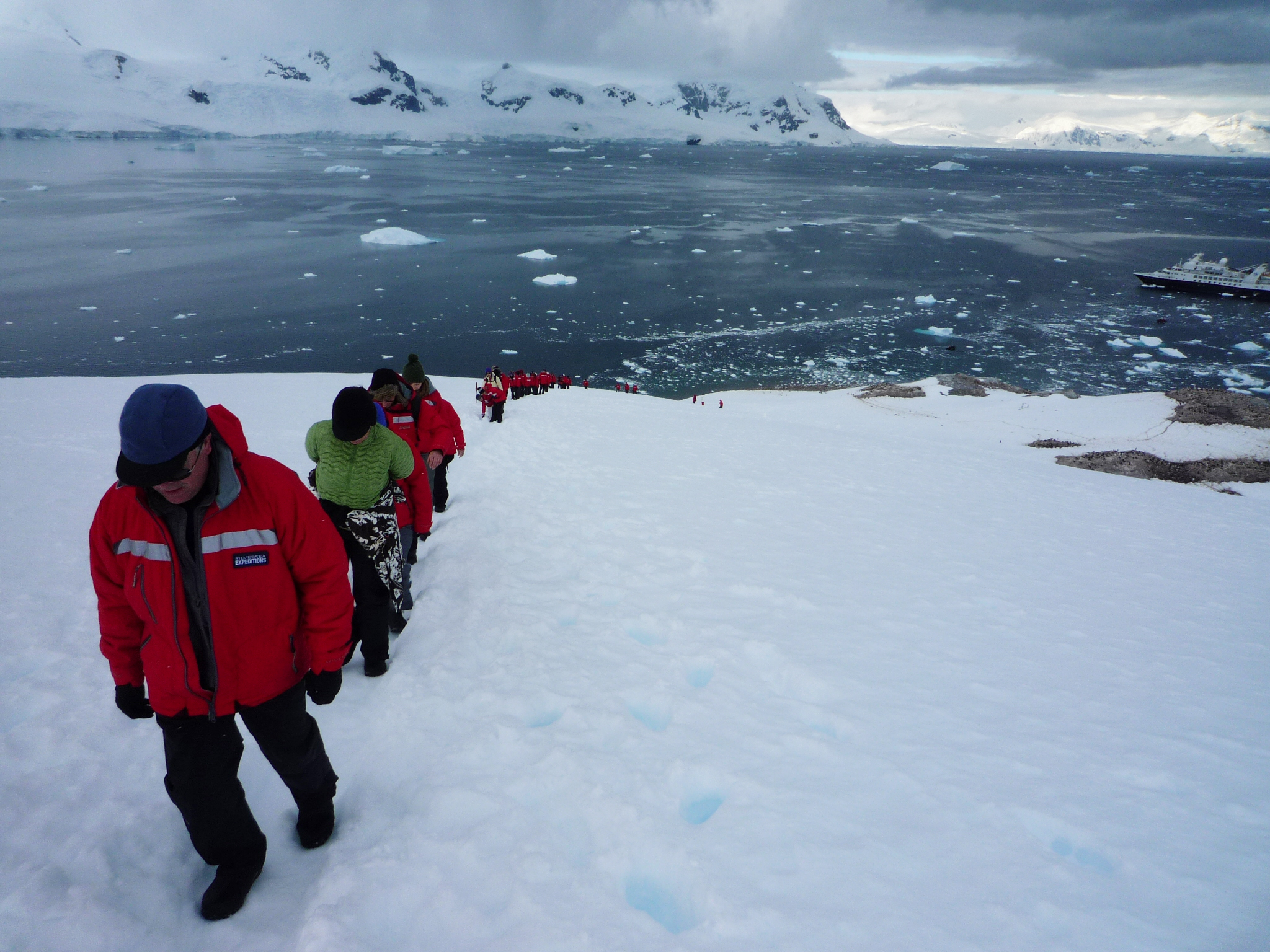 People on the mountain in the antarctic 