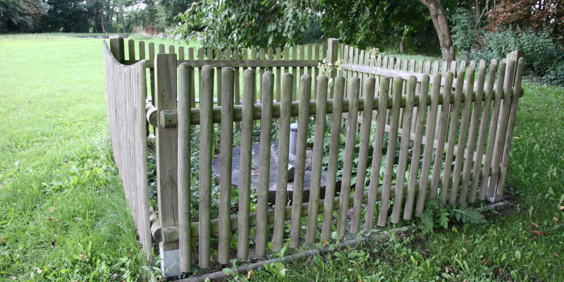 Fenced well to prevent drinking-water contamination.