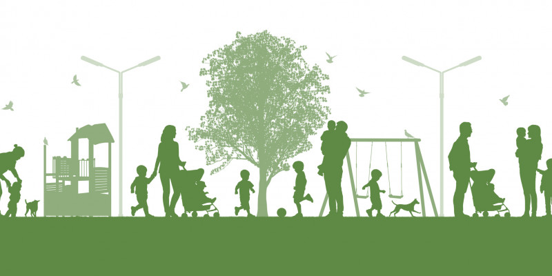 grün-weißes Piktogramm einer Grünanlage in der Stadt mit Bäumen, Spielgeräten und Familien mit Kindern