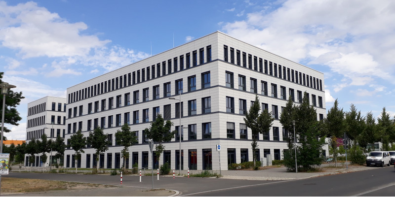 five-story office building at a street intersection