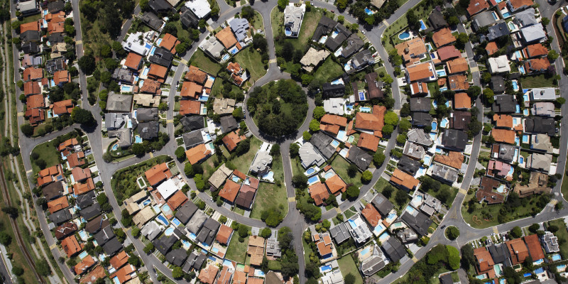 Das Bild zeigt eine Wohnsiedlung aus der Vogelperspektive