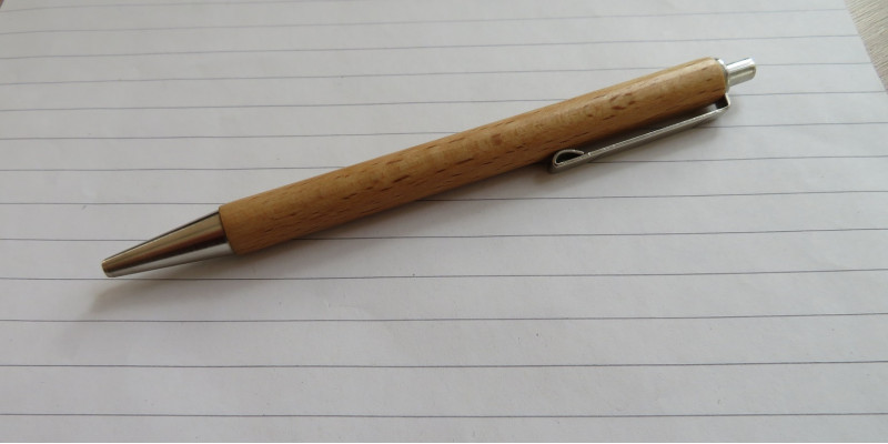 You can see a pen on a sheet of paper
