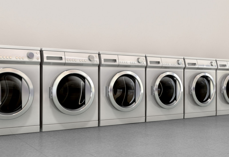 old washing machines in a row