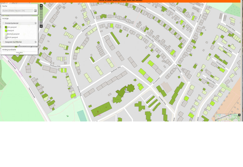 Eine Stadtkarte mit grün eingefärbten Dachflächen