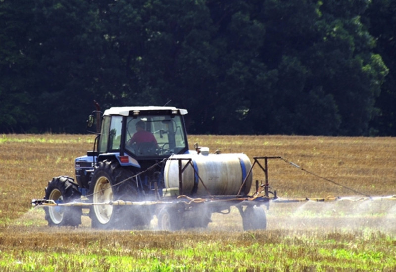 Bauer brings out pesticides in his field