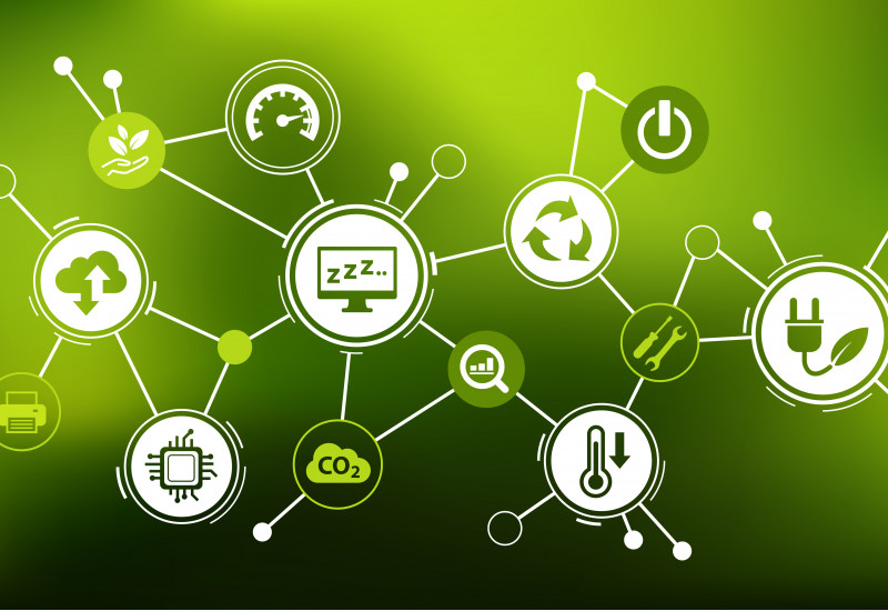 on a green background, several pictograms symbolizing Green IT, such as green electricity or recycling