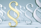 Paragraphen-Symbole in gold und silber im Raum stehend