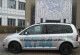 silbergraues Auto mit der Aufschrift "CO₂-Klimaanlagen - klimafreundlich und effizient, R744" und dem Logo des Umweltbundesamtes