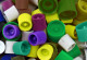 Many different coloured caps from tubes.