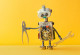 Ein Roboter mit Werkzeug in der Hand auf gelbem Hintergrund