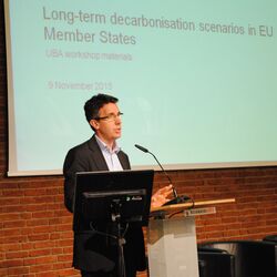 Dan Roberts on a speaker's desk