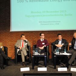 five men are discussing on a scene