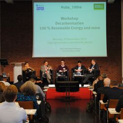 five men are discussing on a scene