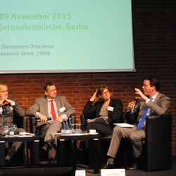 4 men and a woman are discussing on a scene