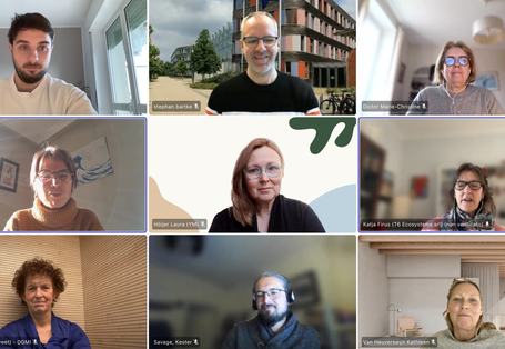 A group of people attending an online meeting.