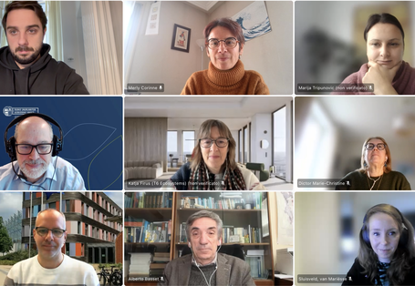 A group of people attending an online meeting