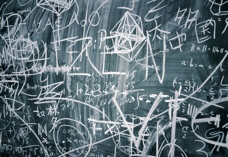 Blackboard with numerous notes.