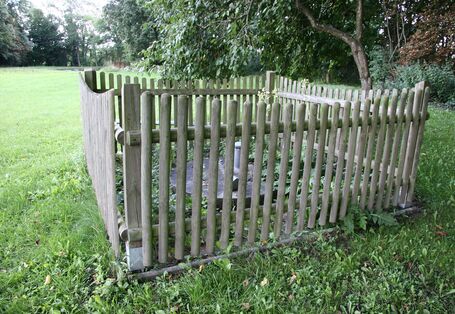 Fenced well to prevent drinking-water contamination.