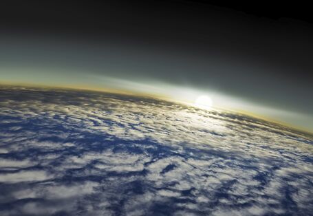 Wolken mit Sonnenaufgang vom All aus
