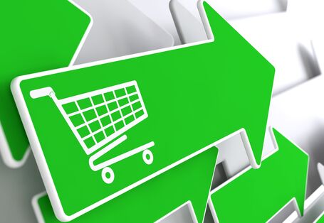 mehrere grüne Pfeile, die in eine Richtung weisen, einer davon mit der Abbildung eines Einkaufswagens