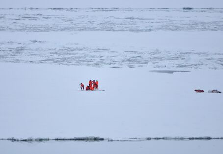 Researchers in the snow