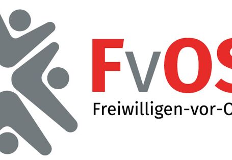 LOGO: Freiwilligen-vor-Ort-System in den Farben Rot und Grau in Buchstaben und Menschen im Kreis schematisch dargestellt.