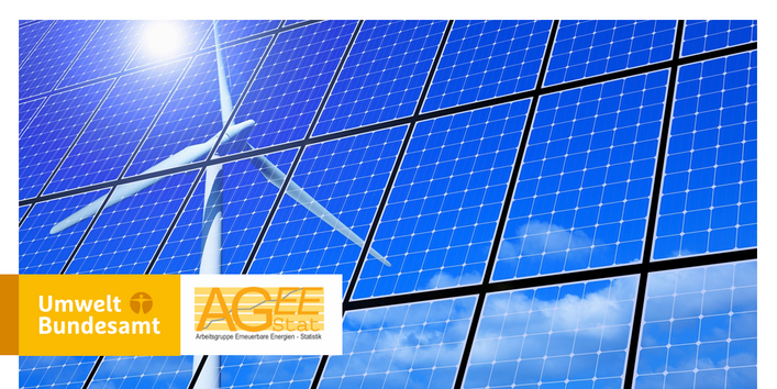 Das Einstiegsbild zeigt Photovoltaik-Elemente in denen sich eien Windrad spiegelt