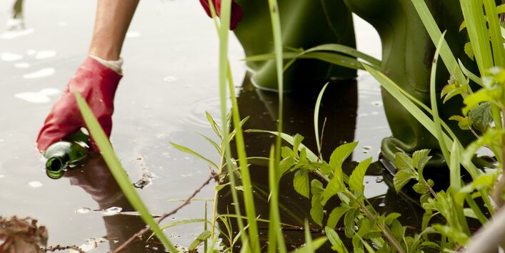 a man is taking a water sampling