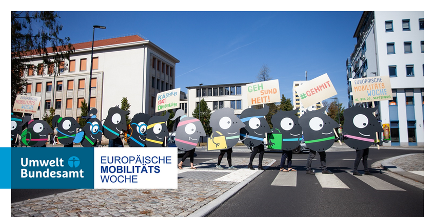 Das Einstiegsbild für den Newsletter zeigt mehrere Maskottchen der Europäischen Mobiliätswoche auf einem Zebrastreifen